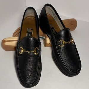 Gucci Black Loafers with Gold Accents